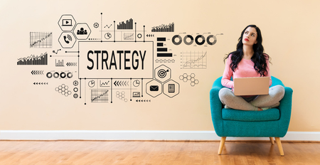 Strategy with young woman using a laptop computerの写真素材