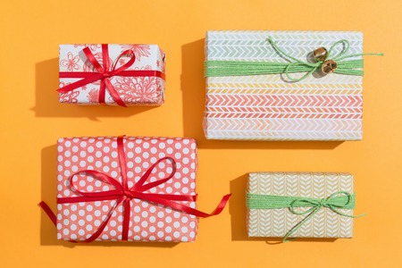 Collection of gift boxes on a orange backgroundの写真素材