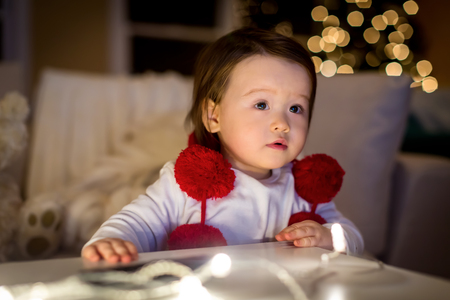 Toddler boy in his house around Christmas timeの写真素材
