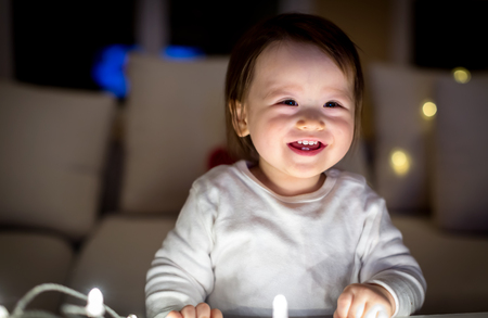 Toddler boy in his house around Christmas timeの写真素材