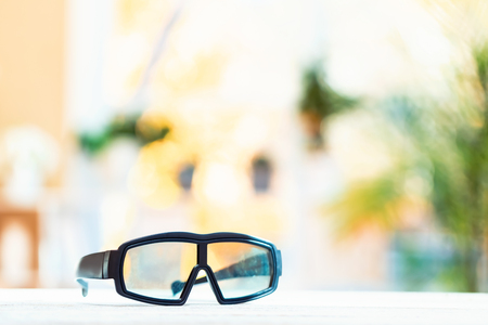 Augmented reality glasses on a bright interior room backgroundの写真素材