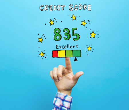Excellent credit score theme with hand on a blue backgroundの写真素材