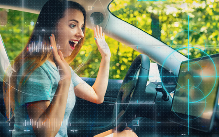 Young woman in a self-driving autonomous electric carの写真素材