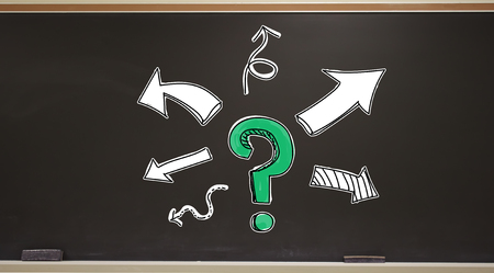 Question mark with arrows on a blackboard with erasers