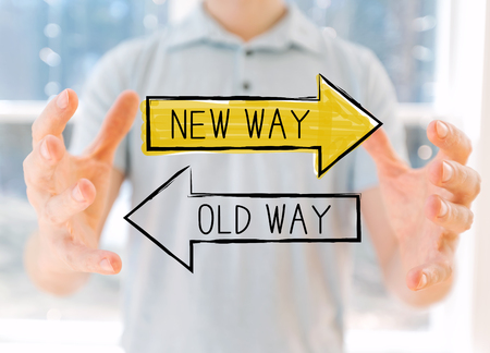 Old way or new way with young man holding his handsの写真素材