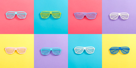 Party theme with celebration accessories on vibrant square titlesの写真素材