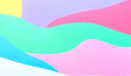 Abstract wavy multi colored paper background designの写真素材