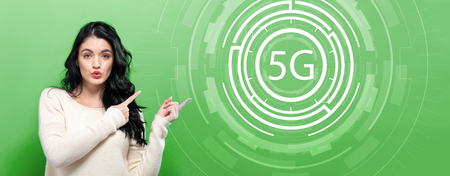 5G network with young woman pointing on a green background