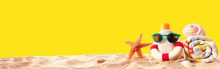 Sunblock Bottle with buoy on a solid backgroundの写真素材