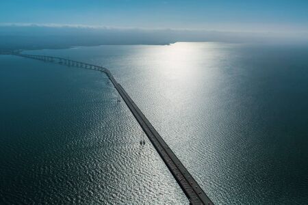 Aerial view of San Mateo Bridge crossing the San Francisco Bay