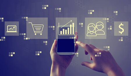 Marketing concept with person holding a white smartphone