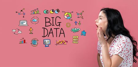 Big data with young woman speaking on a pink backgroundの写真素材