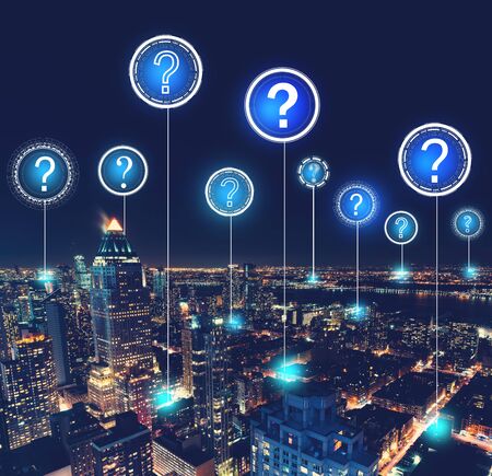 Question marks with aerial view of Manhattan, NY skylineの写真素材