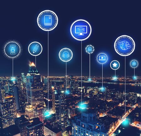 E-Learning with aerial view of Manhattan, NY skylineの写真素材