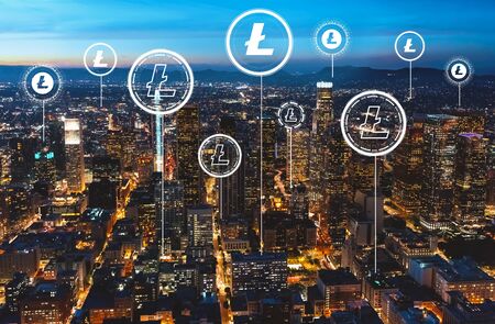 Litecoin with downtown Los Angeles at nightの写真素材