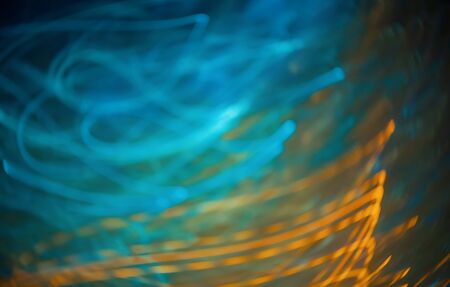 Blurred abstract bokeh background of city lights at nightの写真素材