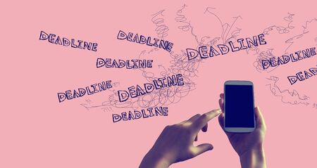Deadline with person holding a white smartphone