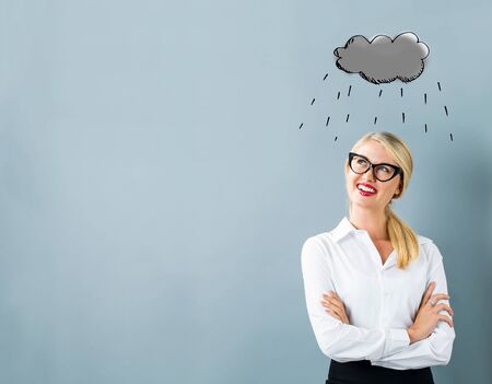 Rain cloud with young woman in a thoughtful face
