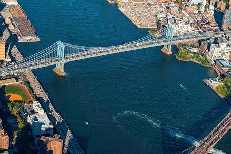 Aerial view of New York City with a view of the Brooklyn and Manhattan Bridgesの写真素材