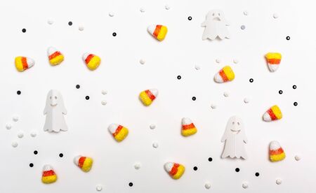 Halloween theme with paper craft decorations on a white backgroundの写真素材