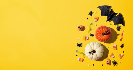 Pumpkins with Halloween decorations - overhead view flat layの写真素材