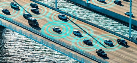 Autonomous vehicles driving and communicating on the highwayの写真素材