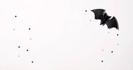 Halloween black paper bat - overhead view flat layの写真素材