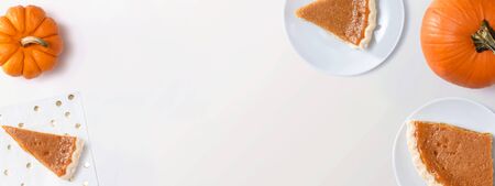 Pumpkin pie with autumn pumpkins - overhead viewの写真素材