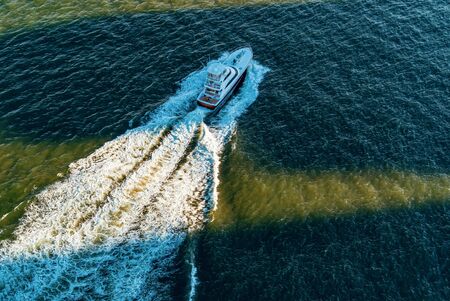 Boat makes its way down the East river in New York City