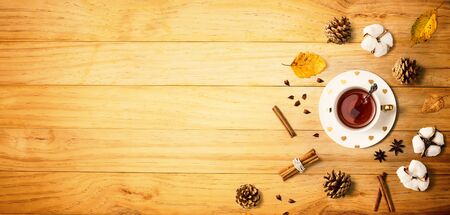 Autumn theme with cinnamon tea - flat layの写真素材
