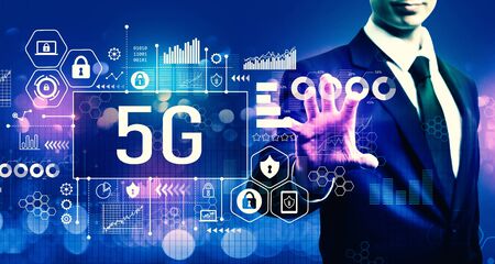 5G network with businessman on blurred blue light backgroundの写真素材