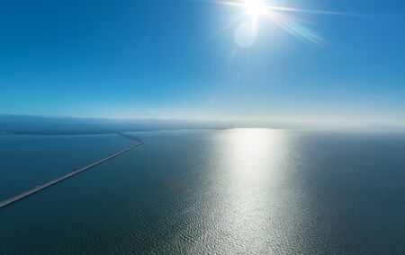 Aerial view of San Mateo Bridge crossing the San Francisco Bay