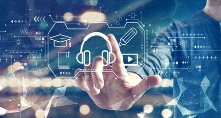 E-learning concept with a man on blurred city background