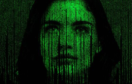 Female face with matrix digital numbers artifical intelligence AI theme with human faceの写真素材