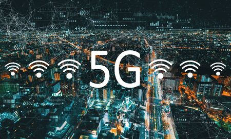 5G network with aerial cityscape view of Japan at night
