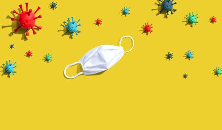 Surgical mask with epidemic influenza and Coronavirus Covid-19 conceptの写真素材