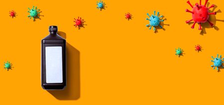 Alcohol bottle with viral epidemic influenza conceptの写真素材