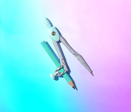 Blue drawing compass overhead view - flat layの写真素材