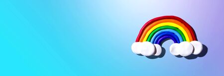 Rainbow and white clouds made with clay - overhead viewの写真素材