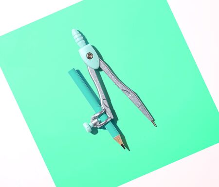 Blue drawing compass overhead view - flat layの写真素材