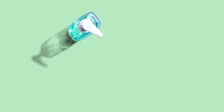 Sanitizer gel bottle on greenの写真素材