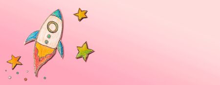 Space exploration theme with rocket and star drawingsの写真素材