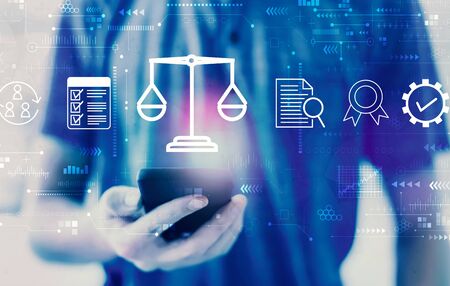Legal advice service concept with young man using a smartphoneの写真素材