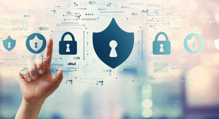 Cyber security theme with hand pressing a button on a technology screen