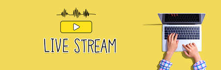 Live stream with woman using a laptop computerの写真素材