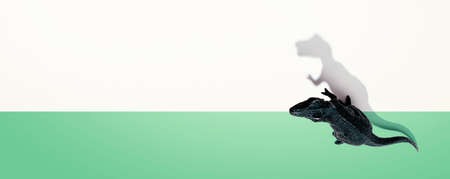 Tyrannosaurus toy with shadow from above - flat layの写真素材