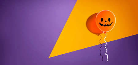 Halloween balloon ghost with happy face - flat layの写真素材