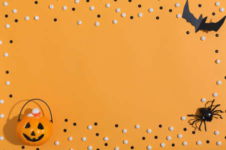 Halloween themed background border on a orange backgroundの写真素材