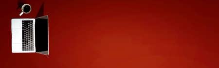 Laptop computer with a coffee mug from aboveの写真素材