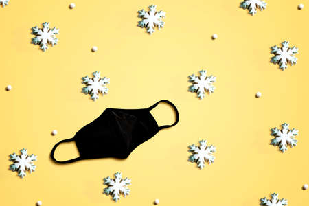 Face mask with snowflakes overhead view - flat layの写真素材